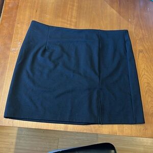 Mini professional black skirt w/ slit